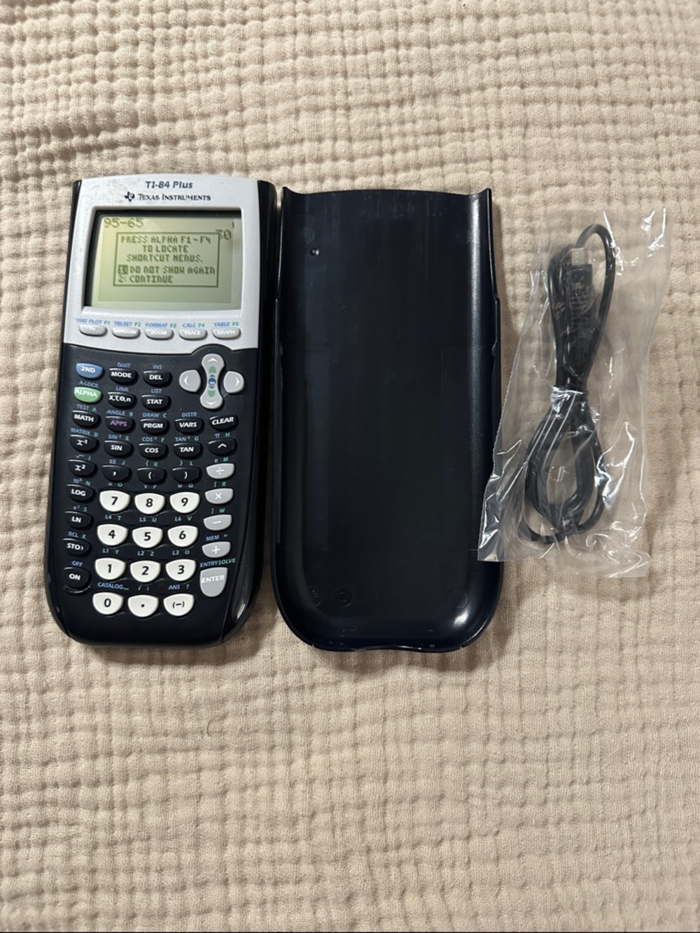 Texas Instruments TI-84 Plus Graphing Calculator - Black and White Buttons